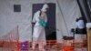 Uganda set to begin Ebola vaccine trial after new outbreak kills nurse