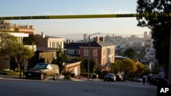 Police tape cordons off a street outside the home of Paul Pelosi and his wife House Speaker Nancy Pelosi, in San Francisco, California, Oct. 28, 2022.