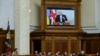 Ukraine's President Volodymyr Zelenskiy attends a session of a parliament while British Prime Minister Boris Johnson addresses Ukrainian lawmakers via videolink, as Russia's attack on Ukraine continues, in Kyiv, Ukraine May 3, 2022.