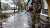 A soldiers stands in a street in Severodonetsk, in eastern Ukraine's Donbass region, on April 13, 2022 as Russian troops intensified a campaign to take the strategic port city of Mariupol, part of an anticipated massive onslaught across eastern Ukraine.