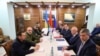 Delagations from Russia and Ukraine hold talks in talks in the Belavezhskaya Pushcha National Park, close to the Polish-Belarusian border, northward from Brest, in Belarus, March 7, 2022.