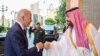 Saudi Crown Prince Mohammed bin Salman fist bumps U.S. President Joe Biden upon his arrival at Al Salman Palace, in Jeddah