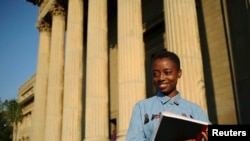 FILE - Second-year civil engineering student Nkululeko Simelane poses for a picture at Wits University in Johannesburg, April 22, 2014.