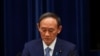 Impopulaire à cause du covid, le Premier ministre japonais jette l'éponge