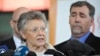 International AIDS Society president Françoise Barre-Sinoussi of France addresses the media in Melbourne on July 19, 2014 while executive director Owen Ryan of Switzerland (L) and president-elect Chris Beyrer (R) (R) of the US look on. 
