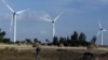 A man walks near the Adama wind farm project built by Chinese Exim bank on the outskirt of Adama Town, east of the capital Addis Ababa, Nov. 5, 2015.