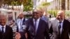 South Africa Finance Minister Nhlanhla Nene, center, arrives at parliament to deliver the annual South Africa budget speech to Parliament in Cape Town, South Africa, Wednesday, Feb. 25, 2015.