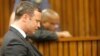 Oscar Pistorius, who was found not guilty in the shooting death of his girlfriend, Reeva Steenkamp, cries in the dock in Pretoria, South Africa, Sept. 11, 2014.
