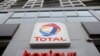 The logo of French oil and gas company Total is seen at a petrol station in Paris, France, February 8, 2021. REUTERS/Sarah Meyssonnier