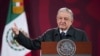 FILE - Mexican President Andres Manuel Lopez Obrador speaks during a press conference at the Palacio Nacional, in Mexico City, Jan. 17, 2022. On Feb. 7, 2022, Lopez Obrador denounced an upcoming auction of pre-Hispanic artifacts in France. (Handout photo 