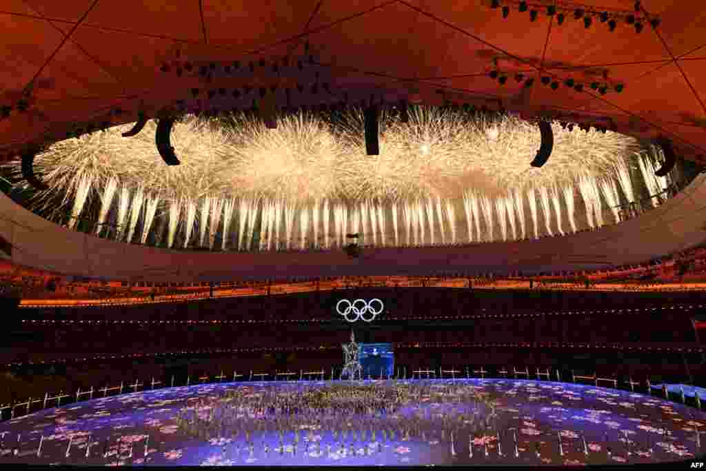 Fireworks light up the sky during the closing ceremony of the Beijing 2022 Winter Olympic Games, at the National Stadium, known as the Bird&#39;s Nest, in Beijing.