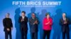 Indian PM Manmohan Singh, Chinese President Xi Jinping, South African President Jacob Zuma, Brazilian President Dilma Rousseff and Russian President Vladimir Putin applaud at a family photo session during the fifth BRICS Summit in Durban, March 27, 2013. 