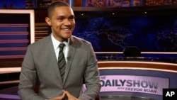 Trevor Noah appears on the set of his new show, "The Daily Show with Trevor Noah," in New York, Sept. 25, 2015.